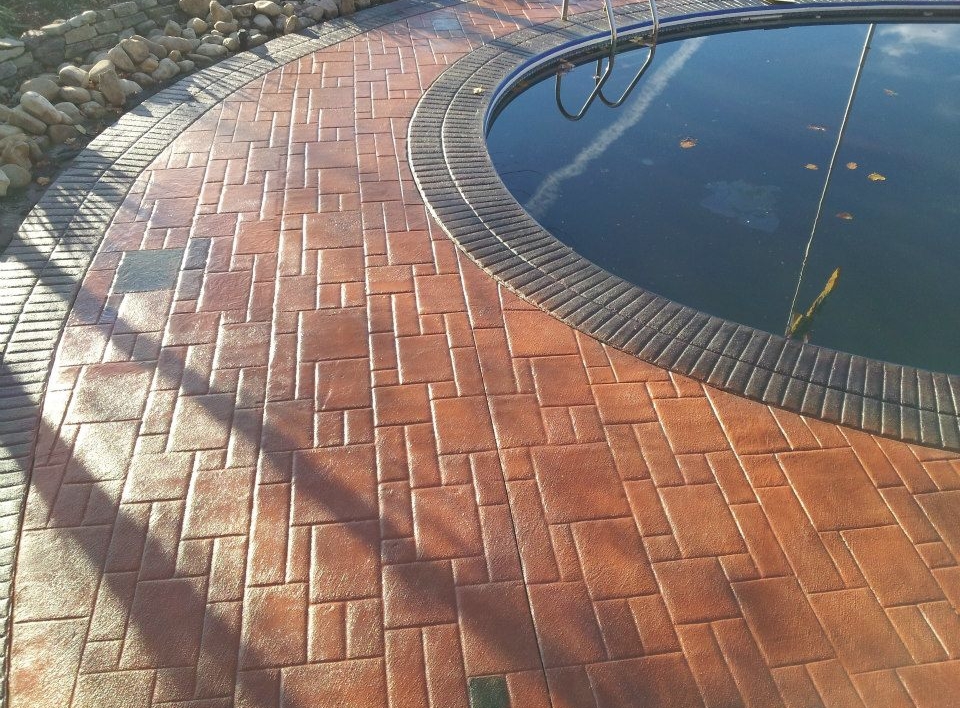 beautiful concrete pool deck construction in the city of San Jose